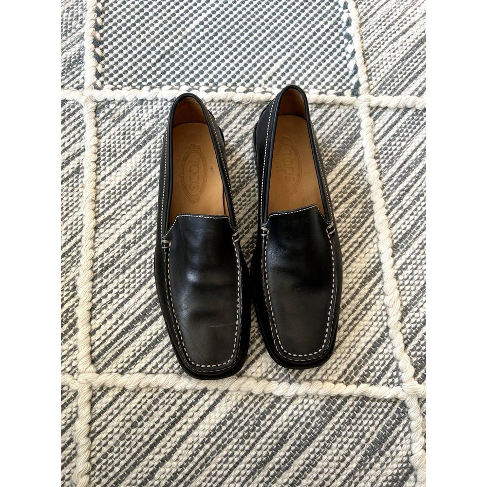 Tod's black leather loafers